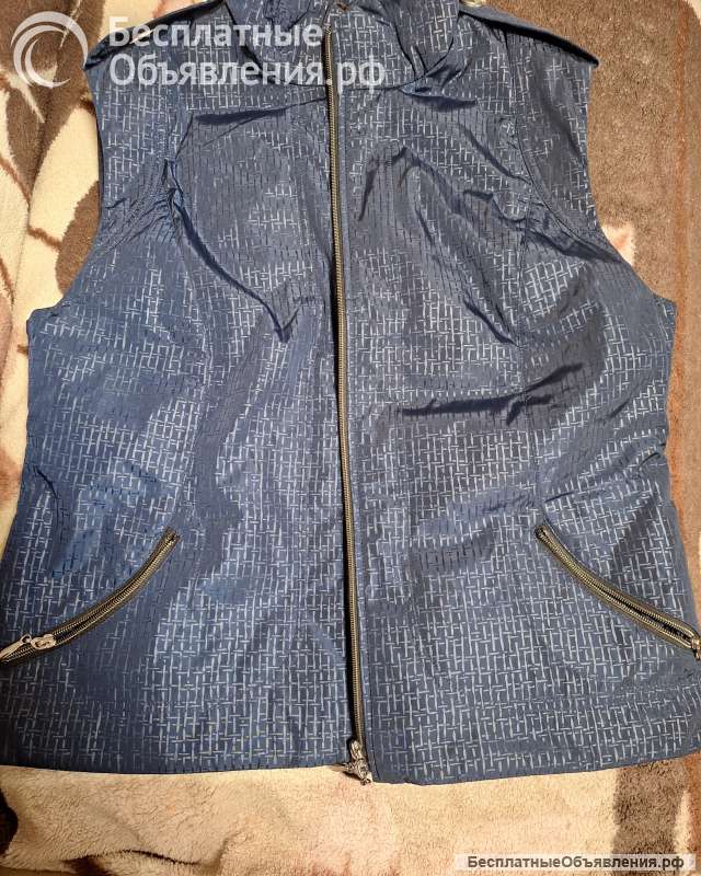 Женская жилетка