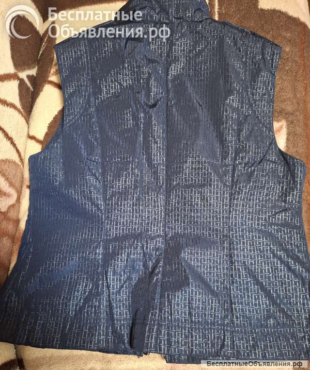 Женская жилетка