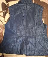 Женская жилетка