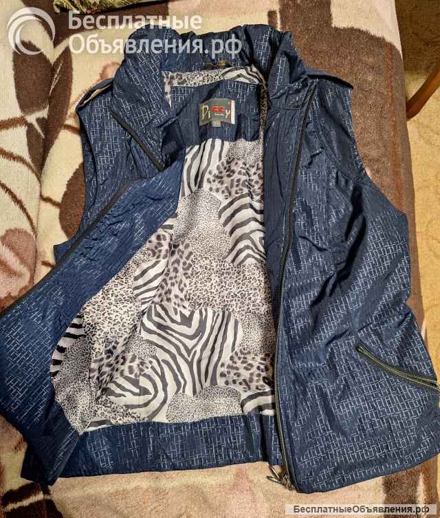 Женская жилетка