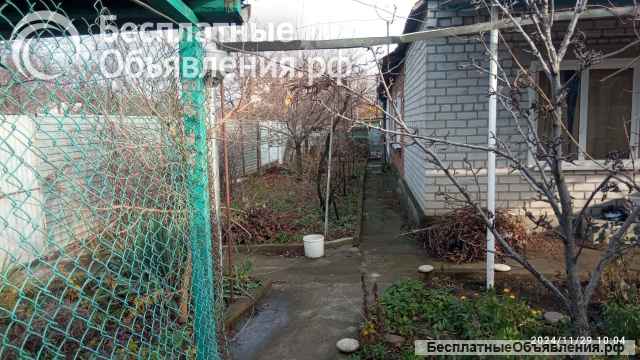 Часть жилого дома и земельного участка