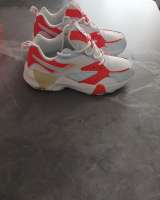 Кроссовки женские