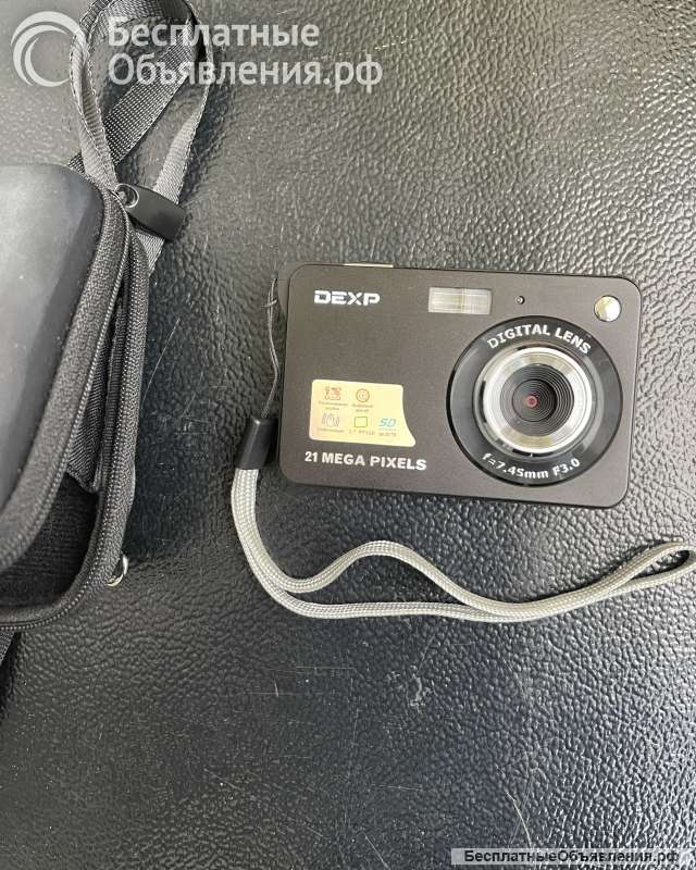 Новый малогабаритный цифровой фотоаппарат в футляре. (DC-5100).