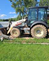 Экскаватор погрузчик TEREX825RM