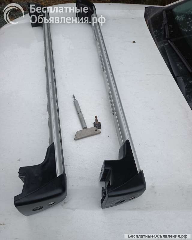 Дуги на багажник, поперечны штатные на крышу на опель оригинальные. Дуги, поперечны штатные