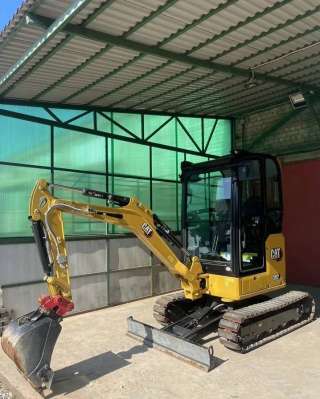 Мини-экскаватор Cat302