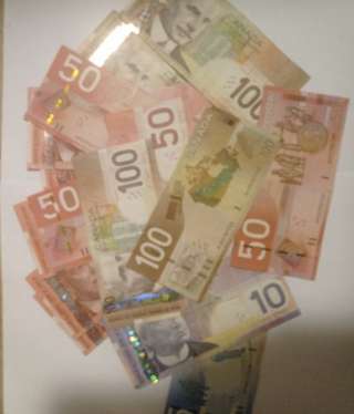 Канадские доллары старого образца