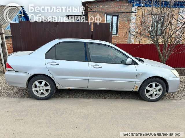 Митсубиси Лансер