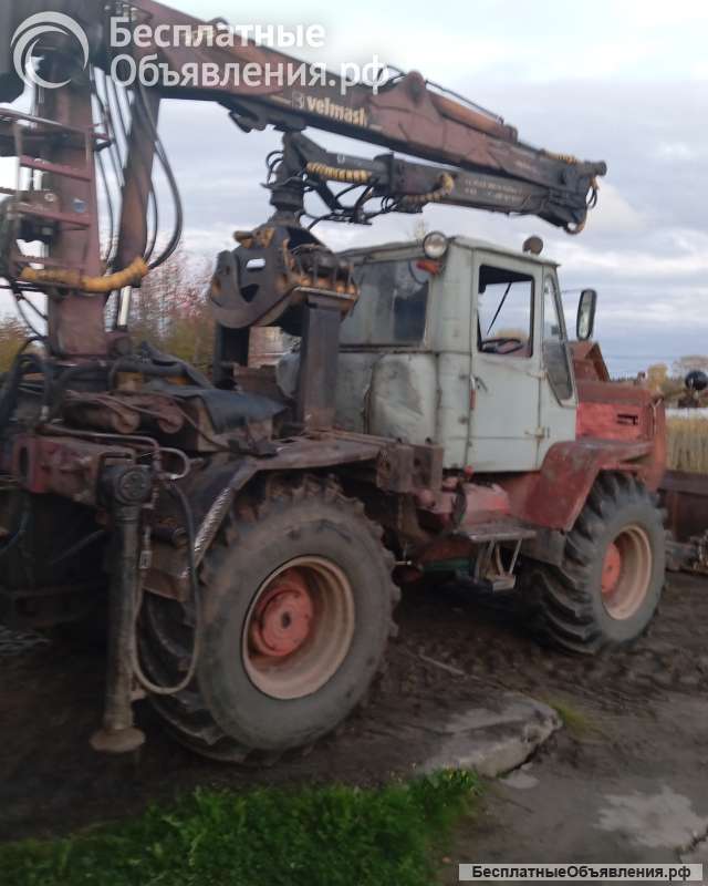 Т-150К с гидроманипулятором и отвалом