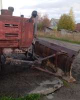 Т-150К с гидроманипулятором и отвалом