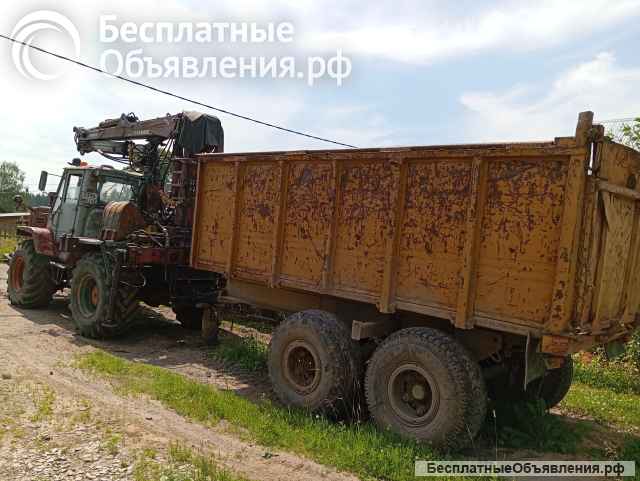 Т-150К с гидроманипулятором и отвалом