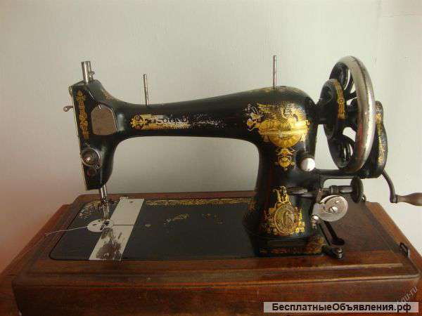Антикварную швейную машинку Singer