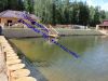 Берегоукрепление водоема лиственницей