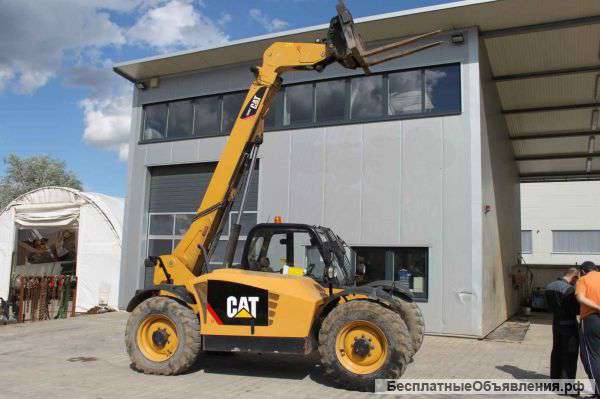 Телескопический погрузчик Caterpillar TH 407