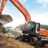 Услуги колесного экскаватора с гидромолотом
