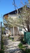 Часть дома с участком