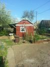 На продажу земельный участок с маленьким домиком