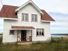Уютный дом для проживания на берегу реки Волги