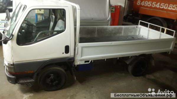 Бортовая грузовая машина Mitsubishi Canter
