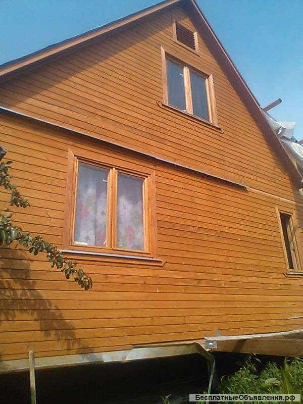 Новый деревяный двухэтажный дом