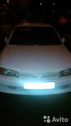 Mitsubishi Mirage белый седан 4 двери, 2000 г., пробег 200 000 - 209 999 км. 1.4 AT (110 л.с.), бенз