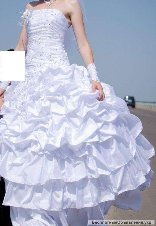 Весільню сукню 40-42 розміру
