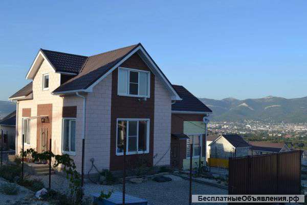 Уютный двухэтажный дом