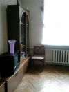 Комнату в 3-х комнатной комунальной квартире