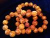 Браслеты янтарные натуральные формованные. Цвет: огненный антик