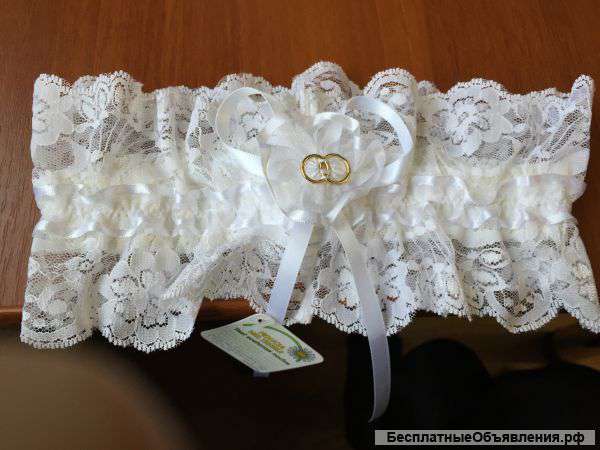 Подвязка новая белого цвета