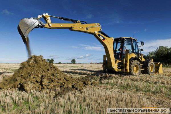 Аренда ямобура на базе экскаватора погрузчика Caterpillar