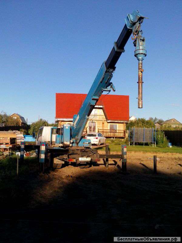 Аренда ямобура на базе экскаватора погрузчика Caterpillar