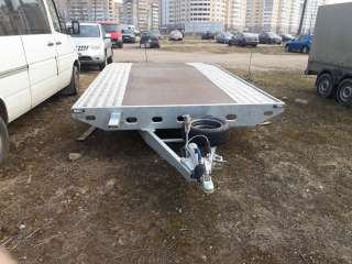 Прицеп-лафета для перевозки автомобиля или другой техники Польского производства RYDWAN
