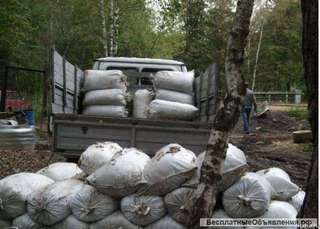 Коровий навоз в мешках