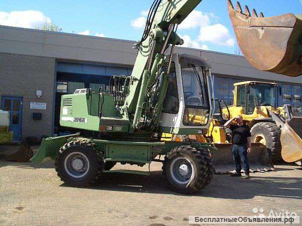 Колесный экскаватор