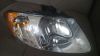 Фару переднюю Крайслер -Додж 2001 г