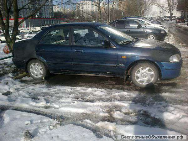 Автомобиль Мазда 323