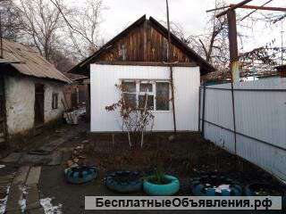 Земельный участок с флигелем