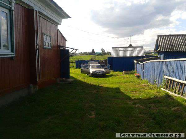Деревянный дом и земельный участок