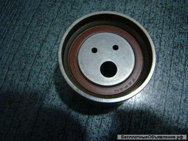 Mitsubishi Hyundai Ролик ремня грм натяжной