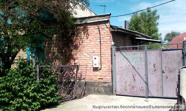 Меняю большой кирпичный дом