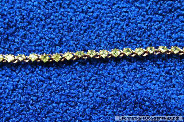 Золотой браслет с хризолитаи