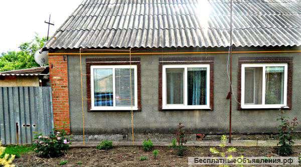 Дом шлакоблок, облицован кирпичом