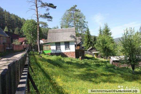 Дом с земельным участком