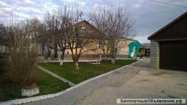 Дом с земельным участком 15 сот