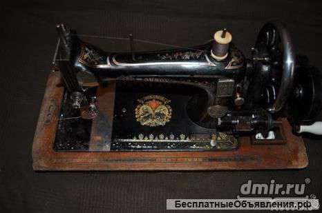 Старинная швейная машинка "Naumann"