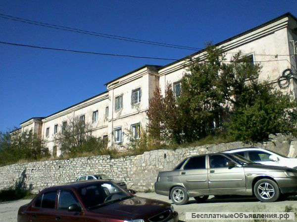 Производственное отдельно стоящее здание с прилегающим земельным участком