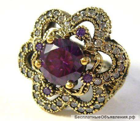 Серебряное кольцо с аметистом украшены бронзой